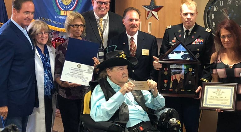 Vietnam Army Sgt. Phillip Yockey is presented with multiple awards by Congressman Brian Higgins. July 22, 2019 (WBEN Photo/Mike Baggerman)