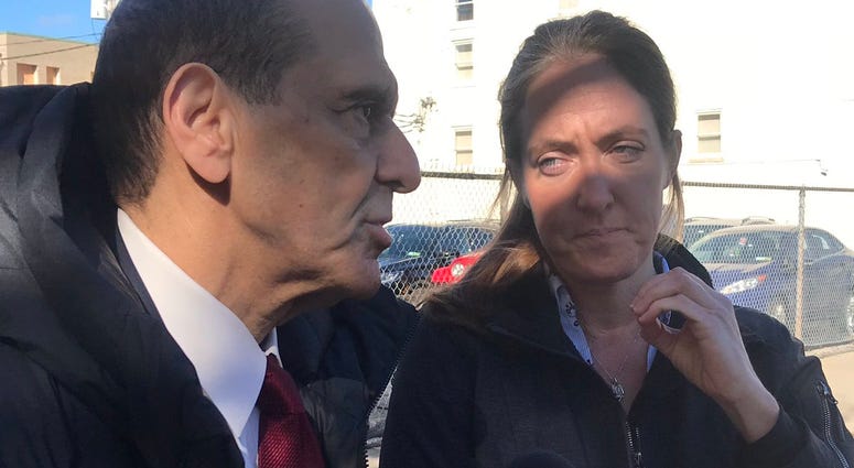 Siobhan O'Connor (right) and Mitchell Garabedian (Left) speak outside the Diocese of Buffalo. October 30, 2018 (WBEN Photo/Brendan Keany)