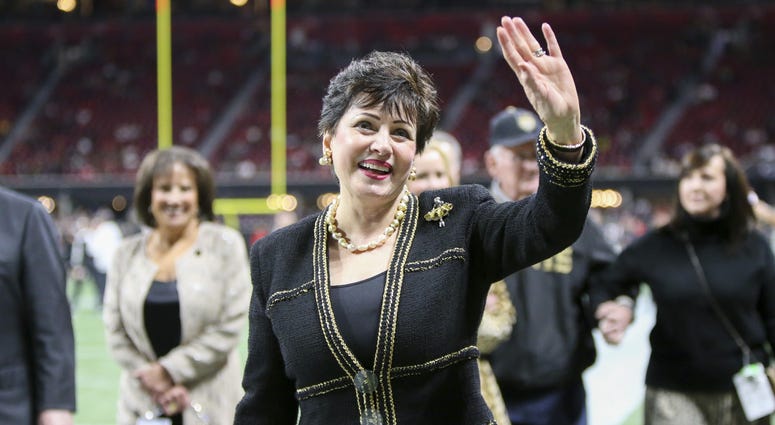New Orleans Saints owner Gayle Benson waves to fans before a game