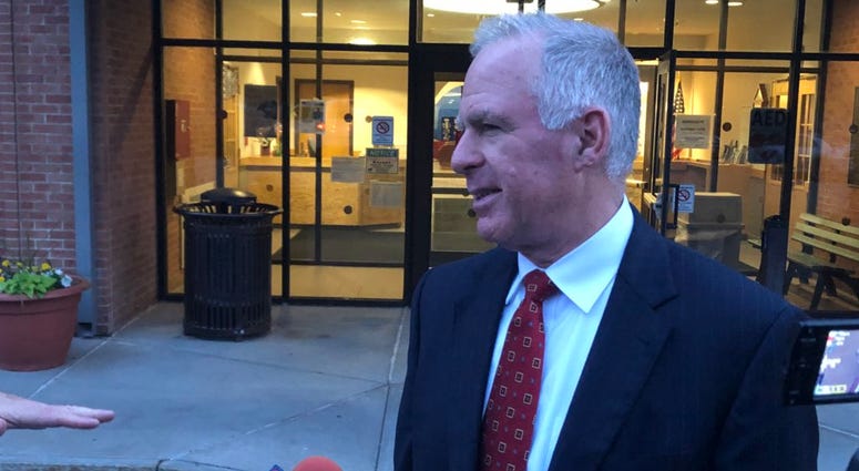 State Senator Michael Ranzenhofer speaks to the media after meeting Livingston County party's executive committee.
