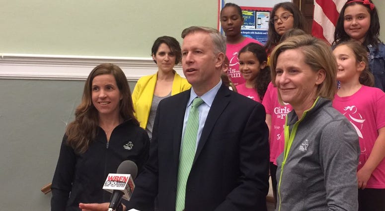 State Senator Chris Jacobs (Senator) with Meghan Cavanaugh (left) and Katie Joyce (right) (WBEN Photo/Mike Baggerman)