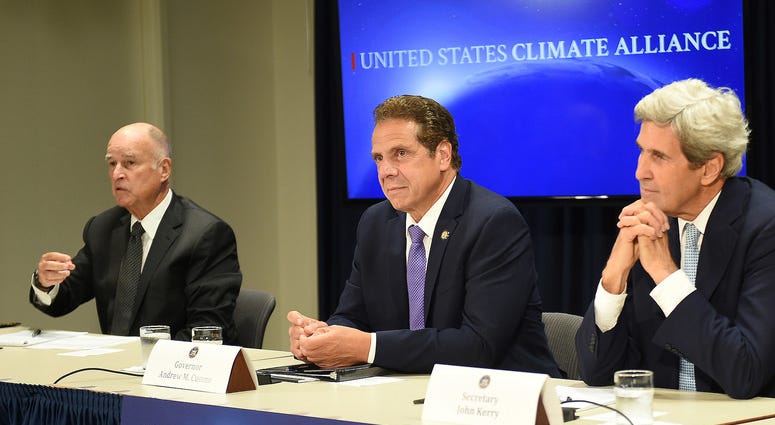 Governor Andrew Cuomo and former Secretary of State John Kerry Governor Andrew Cuomo and former Secretary of State John Kerry