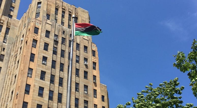 The flag raised outside City Hall (WBEN Photo/Mike Baggerman)