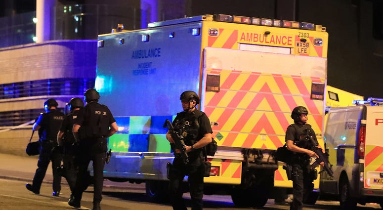 News: Ariana Grande Concert Explosion May 22, 2017; Manchester, England; Police at Manchester Arena after reports of an explosion at the venue during an Ariana Grande concert. Mandatory Credit: PA Images/Sipa USA via USA TODAY NETWORK