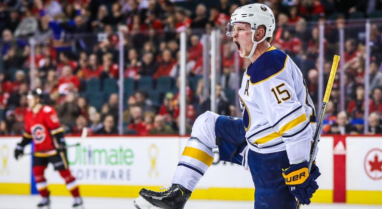 Jan 22, 2018; Calgary, Alberta, CAN; Buffalo Sabres center Jack Eichel (15) celebrates his goal against the Calgary Flames during the overtime period at Scotiabank Saddledome. Buffalo Sabres won 2-1. Jan 22, 2018; Calgary, Alberta, CAN; Buffalo Sabres center Jack Eichel (15) celebrates his goal against the Calgary Flames during the overtime period at Scotiabank Saddledome. Buffalo Sabres won 2-1.