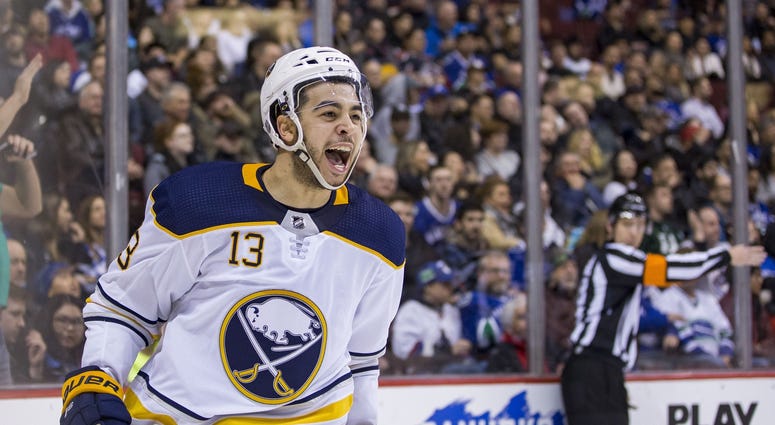 Jan 25, 2018; Vancouver, British Columbia, CAN; Buffalo Sabres right wing Nicholas Baptiste (13) celebrates his goal against the Vancouver Canucks during the second period at Rogers Arena. Jan 25, 2018; Vancouver, British Columbia, CAN; Buffalo Sabres right wing Nicholas Baptiste (13) celebrates his goal against the Vancouver Canucks during the second period at Rogers Arena.