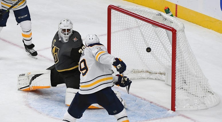Oct 17, 2017; Las Vegas, NV, USA; Buffalo Sabres left wing Evander Kane (9) bats a puck out of the air past Vegas Golden Knights goalie Malcolm Subban (30) to tie the game late in the third period of a game at T-Mobile Arena. Oct 17, 2017; Las Vegas, NV, USA; Buffalo Sabres left wing Evander Kane (9) bats a puck out of the air past Vegas Golden Knights goalie Malcolm Subban (30) to tie the game late in the third period of a game at T-Mobile Arena.