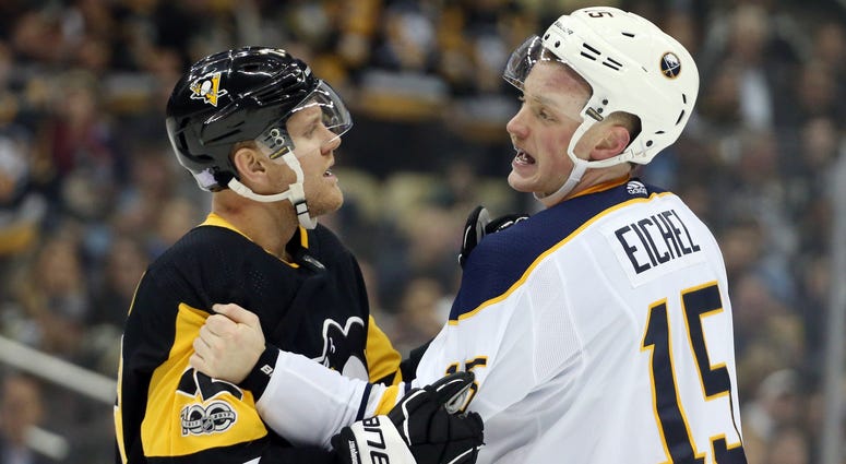 Nov 14, 2017; Pittsburgh, PA, USA; Pittsburgh Penguins right wing Patric Hornqvist (72) restrains Buffalo Sabres center Jack Eichel (15) during the first period at PPG PAINTS Arena. Nov 14, 2017; Pittsburgh, PA, USA; Pittsburgh Penguins right wing Patric Hornqvist (72) restrains Buffalo Sabres center Jack Eichel (15) during the first period at PPG PAINTS Arena.