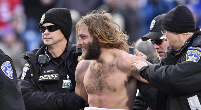 Nov 12, 2017; Orchard Park, NY, USA; Buffalo police remove a streaker from the field during the fourth quarter a game against the New Orleans Saints at New Era Field. Nov 12, 2017; Orchard Park, NY, USA; Buffalo police remove a streaker from the field during the fourth quarter a game against the New Orleans Saints at New Era Field.