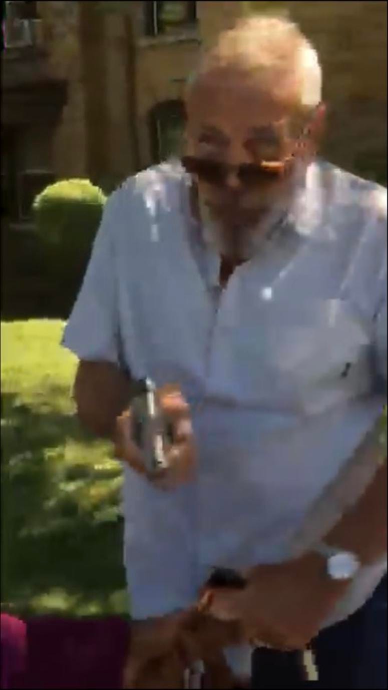 Jeffrey Calhoun pointing a pistol at a group of people after a traffic accident in Buffalo. July 15, 2019 Photo Courtesy of Precious Santiaga