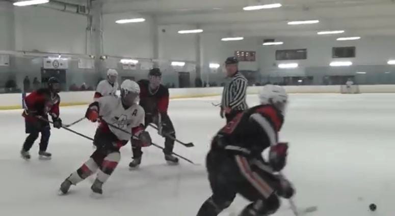 Screenshot from video where Cheektowaga hockey players make monkey noises at Amherst hockey who is black. (Screenshot courtesy of Bob Kazee)