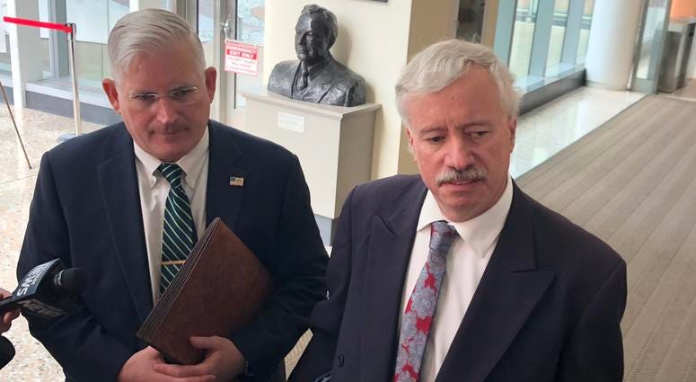 Erie County Clerk Mickey Kearns and Assistant Erie County Attorney Ken Kirby after oral arguments in the Green Light Law case. October 23, 2019 (WBEN Photo/Mike Baggerman)