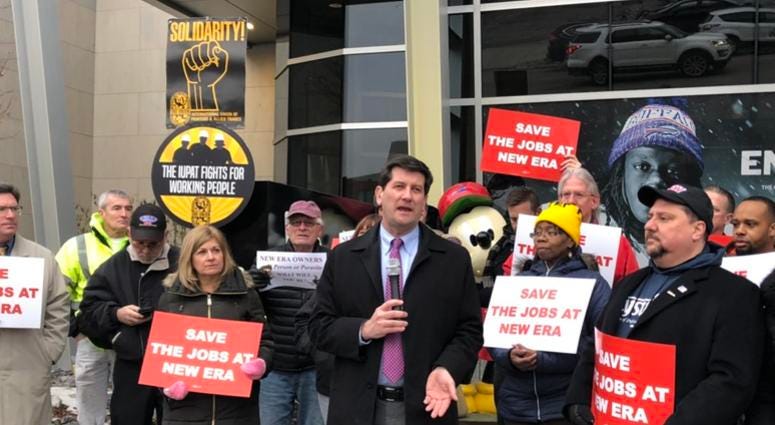 Mark Poloncarz speaking at a labor rally outside New Era headquarters.