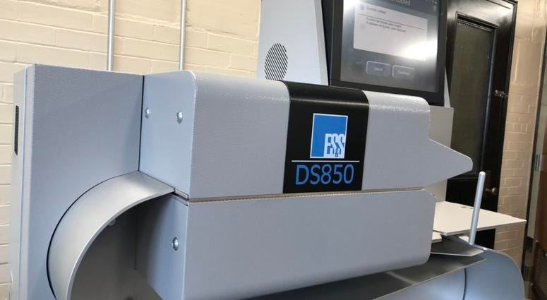 The scanner used in the absentee ballot count for NY-27. November 19, 2018 (WBEN Photo/Mike Baggerman)
