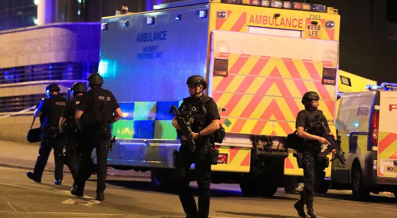 News: Ariana Grande Concert Explosion May 22, 2017; Manchester, England; Police at Manchester Arena after reports of an explosion at the venue during an Ariana Grande concert. Mandatory Credit: PA Images/Sipa USA via USA TODAY NETWORK