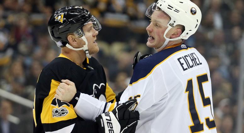 Nov 14, 2017; Pittsburgh, PA, USA; Pittsburgh Penguins right wing Patric Hornqvist (72) restrains Buffalo Sabres center Jack Eichel (15) during the first period at PPG PAINTS Arena. Nov 14, 2017; Pittsburgh, PA, USA; Pittsburgh Penguins right wing Patric Hornqvist (72) restrains Buffalo Sabres center Jack Eichel (15) during the first period at PPG PAINTS Arena.