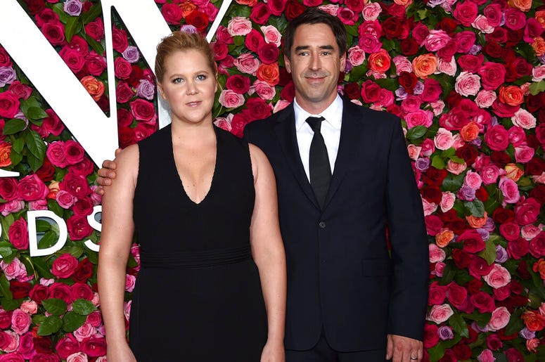 Amy Schumer and Chris Fischer