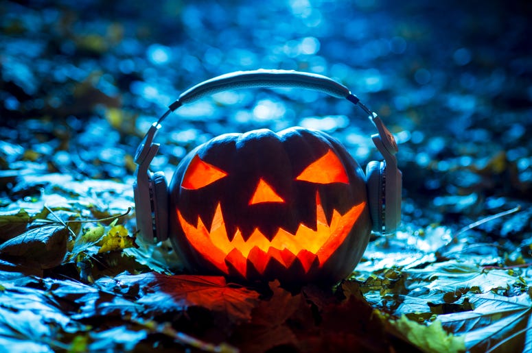 Halloween pumpkin with headphones