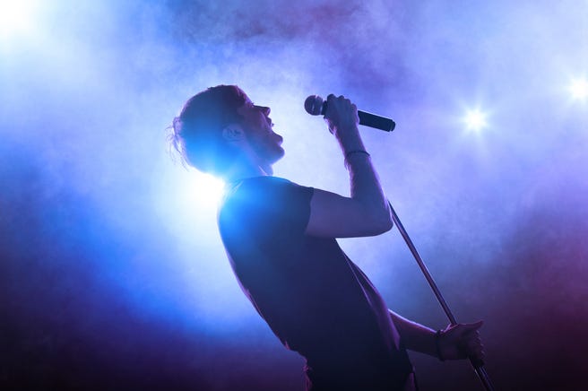Singer with microphone on stage