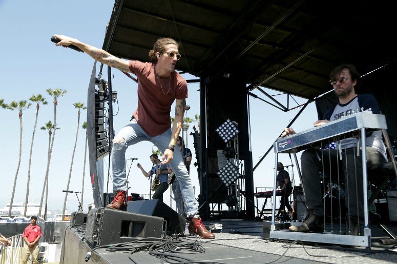 David Shaw (L) and Ed Williams of the Revivalists perform following the Synchrony Rock'n'Roll San Diego Marathon The Revivalists