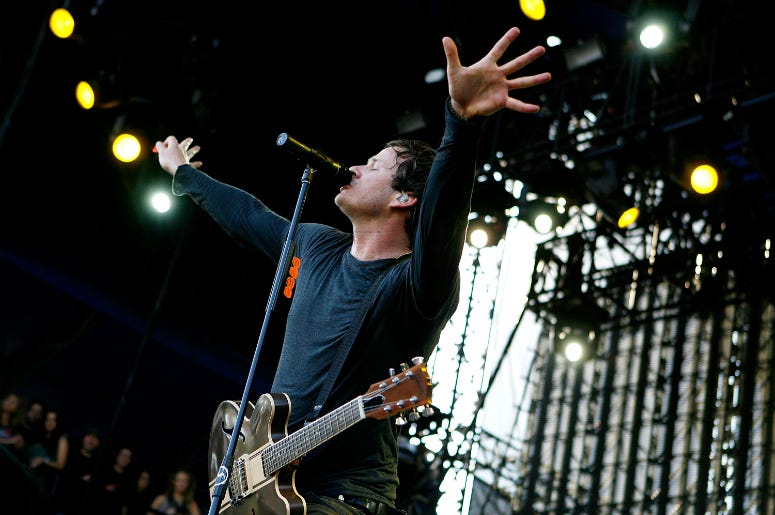 Tom DeLonge with Angels and Airwaves performs during the 2008 Voodoo Experience Tom DeLonge with Angels and Airwaves performs during the 2008 Voodoo Experience