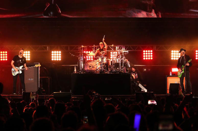 Mark Hoppus, Travis Barker, and Matt Skiba of blink-182 perform onstage at KROQ Weenie Roast 2018 Mark Hoppus, Travis Barker, and Matt Skiba of blink-182 perform onstage at KROQ Weenie Roast 2018