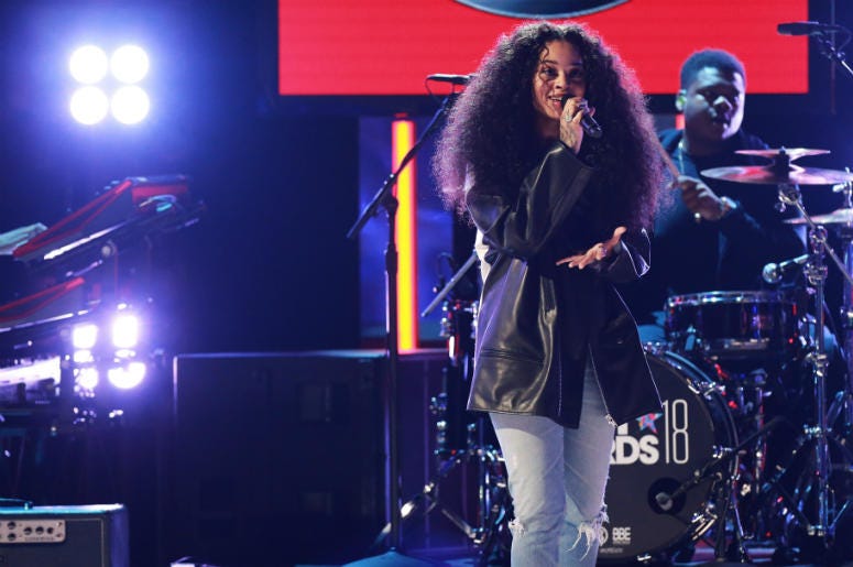 Ella Mai performs onstage at the 2018 BET Awards at Microsoft Theater on June 24, 2018 in Los Angeles, California. Ella Mai performs onstage at the 2018 BET Awards at Microsoft Theater on June 24, 2018 in Los Angeles, California.