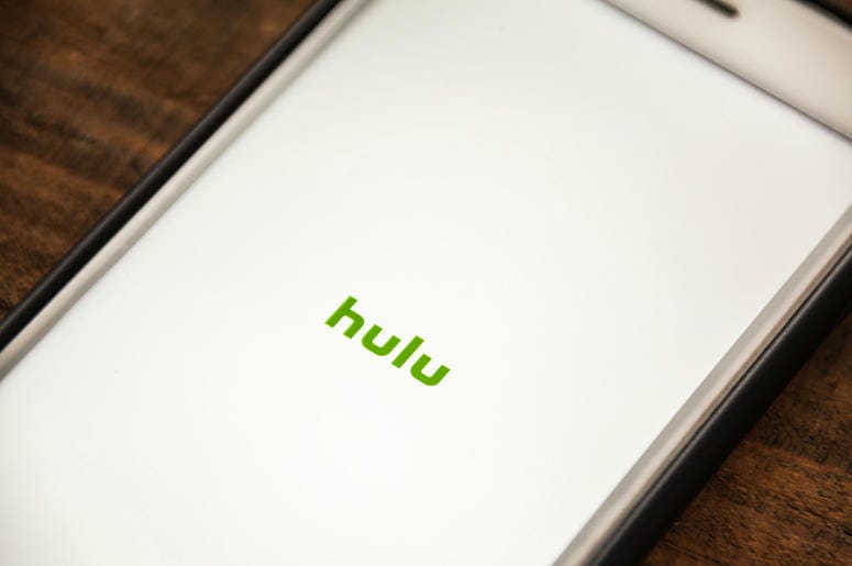 Vignette Selective Focus Apple iPhone 6+ with Hulu application showing on screen. Hulu is a streaming video app. Vignette Selective Focus Apple iPhone 6+ with Hulu application showing on screen. Hulu is a streaming video app.