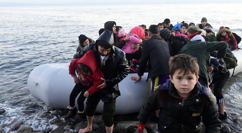Thousands of migrants and refugees massed at Turkey's western frontier.