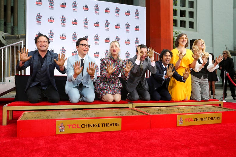 Johnny Galecki, from left, Jim Parsons, Kaley Cuoco, Simon Helberg, Kunal Nayyar, Mayim Bialik and Melissa Rauch members of the cast of the TV series "The Big Bang Theory," show their hands after placing them in cement during a hand and footprint ceremony Johnny Galecki, from left, Jim Parsons, Kaley Cuoco, Simon Helberg, Kunal Nayyar, Mayim Bialik and Melissa Rauch members of the cast of the TV series "The Big Bang Theory," show their hands after placing them in cement during a hand and footprint ceremony