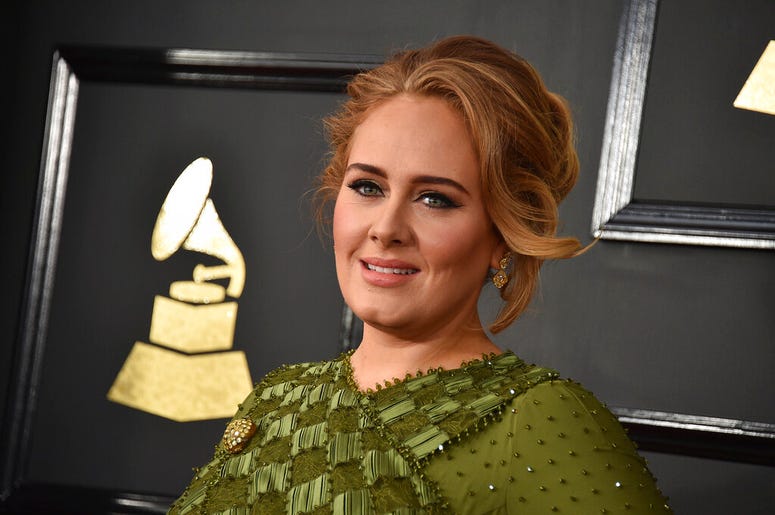 Adele arrives at the 59th annual Grammy Awards Adele arrives at the 59th annual Grammy Awards