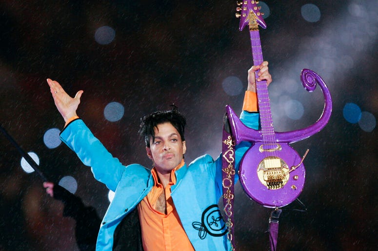 Prince performs during halftime of the Super Bowl XLI football game in Miami.