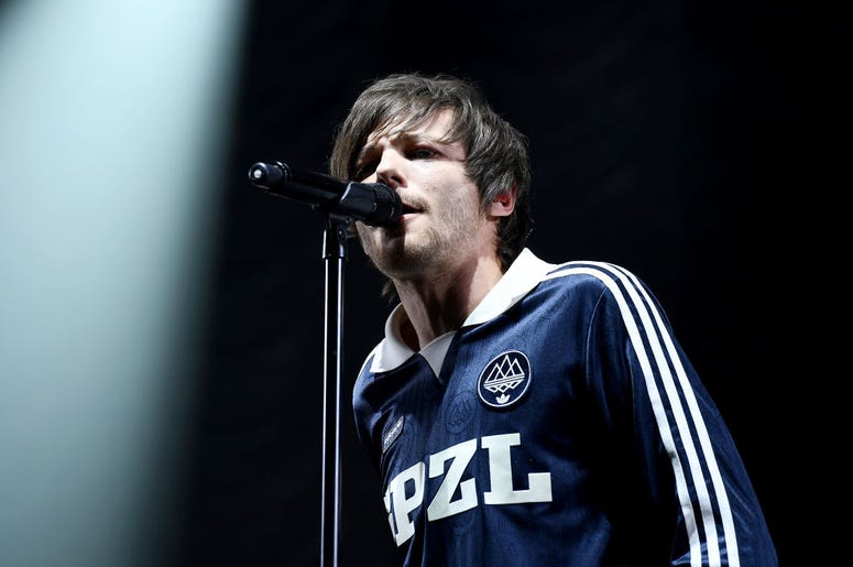 BIRMINGHAM, ENGLAND - MAY 04: Louis Tomlinson performs on stage during Free Radio Hits Live at Arena Birmingham on May 04, 2019 in Birmingham, England.