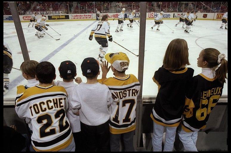 22 Dec 1995: Young fans watch a game between the Montreal Canadiens and the Pittsburgh Penguins played at the Civic Arena in Pittsburgh, Pennsylvania. The Canadiens won the game, 4-2.