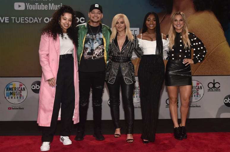 Ella Mai, Kane Brown, Bebe Rexha, Normani & Chelsea Briggs Ella Mai, Kane Brown, Bebe Rexha, Normani and Chelsea Briggs attend the 2018 American Music Awards Nominations Announcement at YouTube Space LA on September 12, 2018 in Los Angeles, California.