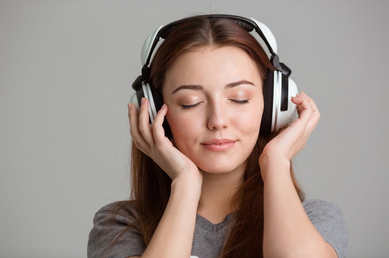 Woman Listening To ASMR