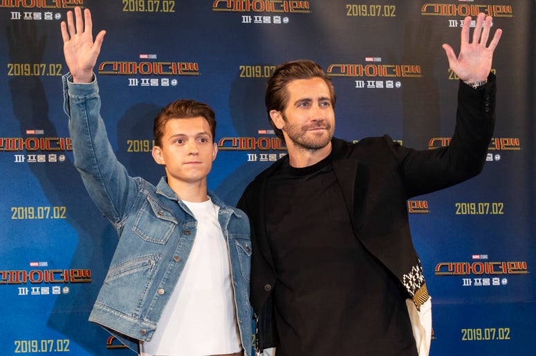 Actors Tom Holland (L) and Jake Gyllenhaal greet fans during a promotion activity of the film "Spider-Man: Far From Home" Actors Tom Holland (L) and Jake Gyllenhaal greet fans during a promotion activity of the film "Spider-Man: Far From Home"