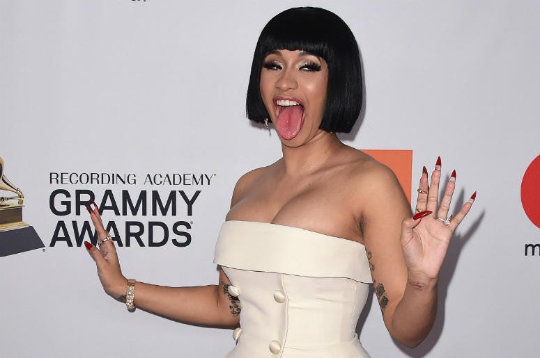 Cardi B NEW YORK - JANUARY 27: Cardi B at the 2018 Clive Davis Pre-Grammy Gala at the Sheraton New York Times Square on January 27, 2018 in New York, New York.