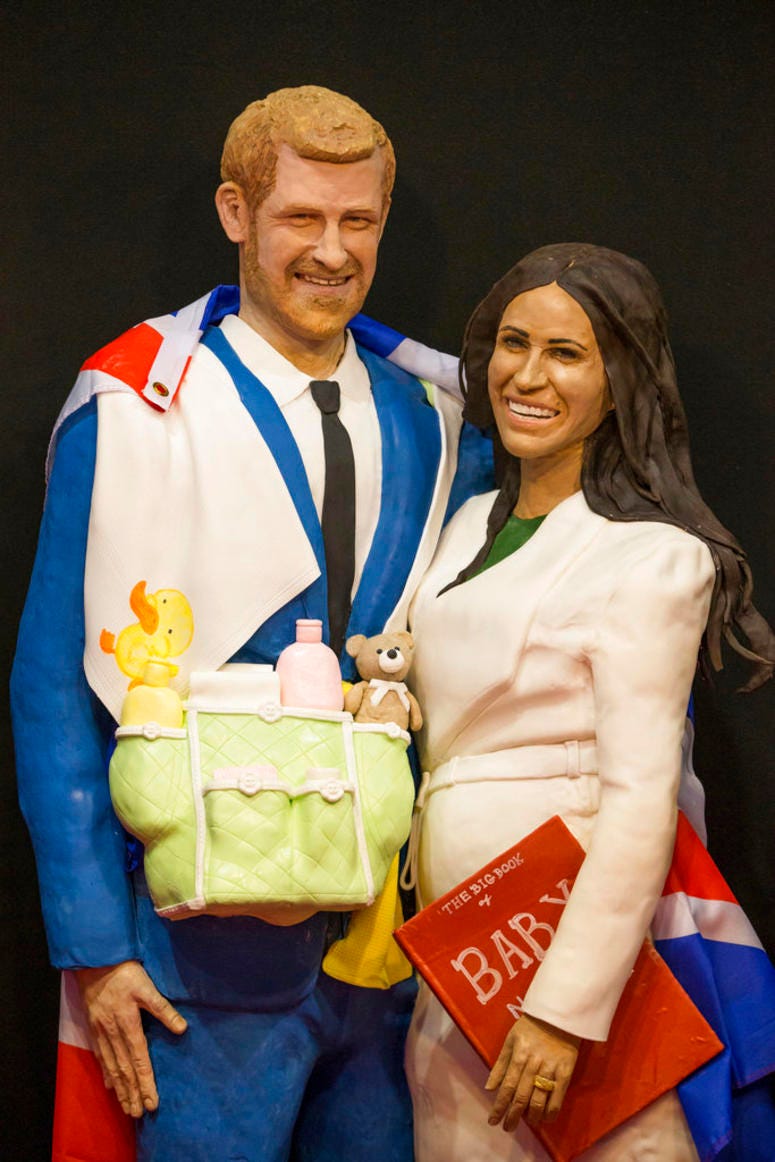 A life-size cake depicting Britain's Prince Harry and Meghan, Duchess of Sussex on display during Cake International, DO NOT USE