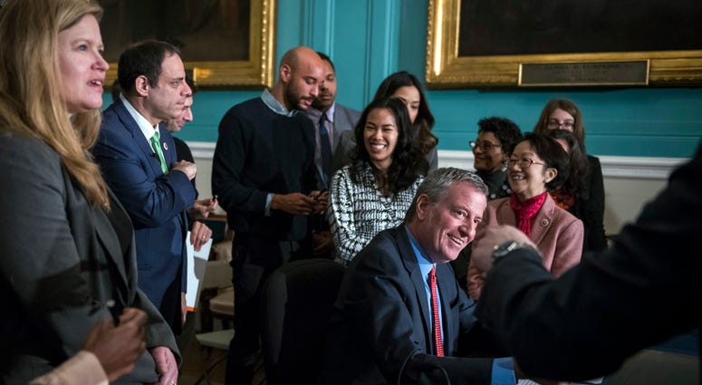 Mayor Bill de Blasio signs bill to expand healthcare benefits to surviving family members of 9/11 on Feb. 11, 2020. Mayor Bill de Blasio