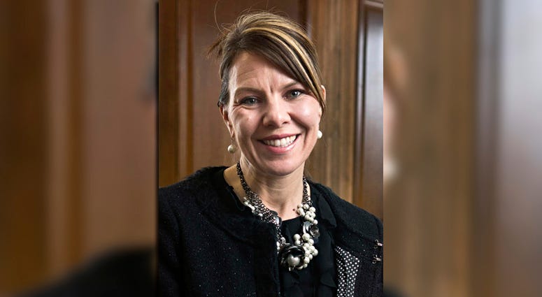 In this 2017 photo, Jennifer Riordan, of Albuquerque, N.M., poses for a photo in Albuquerque. Jennifer Riordan