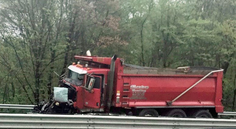 A dump truck sits near the scene after a collision with a school bus in Mount Olive, N.J., Thursday, May 17, 2018. Deadly New Jersey School Bus Crash