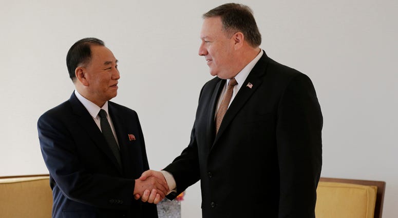 Kim Yong Chol, left, former North Korean military intelligence chief and one of leader Kim Jong Un's closest aides, shakes hands with U.S. Secretary of State Mike Pompeo during a meeting, Thursday, May 31, 2018, in New York. Kim Yong Chol, Mike Pompeo