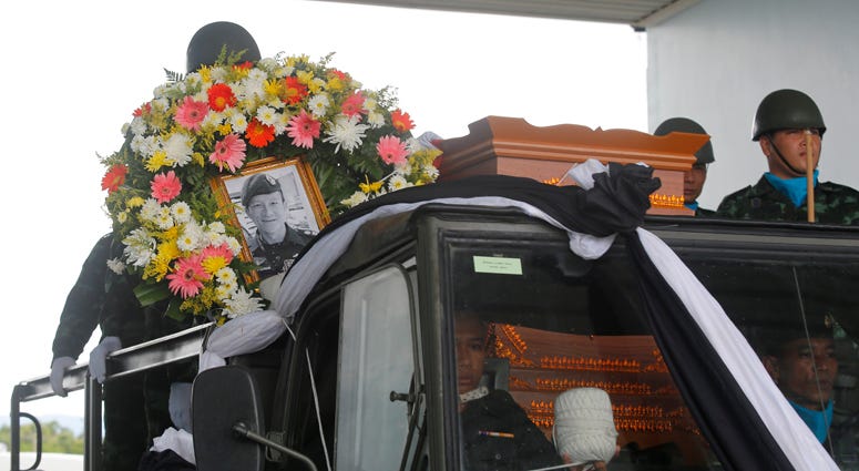 The body of Saman Gunan, a former Thai navy SEAL who died during an overnight mission, is carried during a repatriation and religious rites ceremony at Chiang Rai Airport in Mae Sai, Chiang Rai province, in northern Thailand Friday, July 6, 2018. Former Thai navy SEAL Dies During Cave Rescue