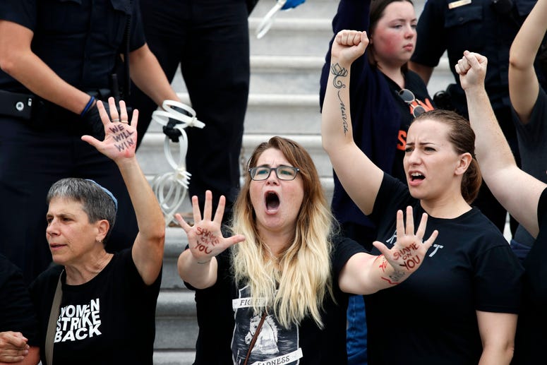 Protesters denounced the Senate's decision to confirm Brett Kavanaugh. Kavanaugh Protesters