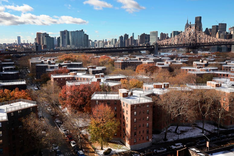 The Queensbridge Houses sit beneath the Ed Koch Queensboro Bridge, upper right, Friday, Nov. 16, 2018, in New York. Amazon LIC Headquarters
