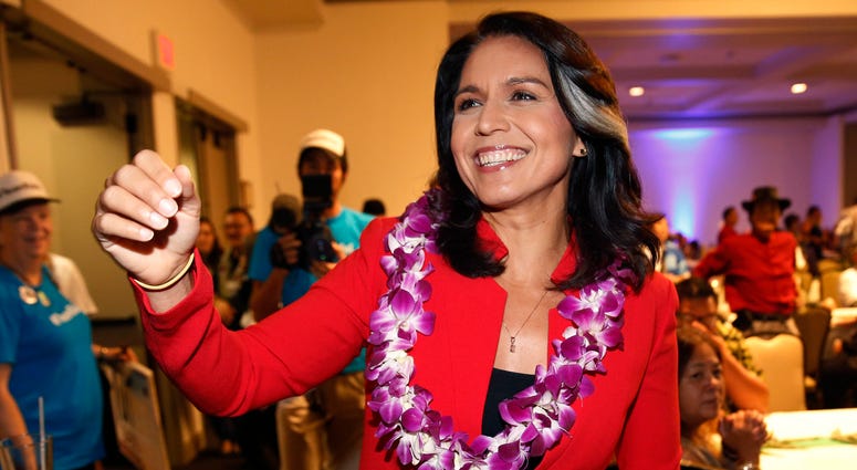 In this Nov. 6, 2018, file photo, Rep. Tulsi Gabbard, D-Hawaii, greets supporters in Honolulu. Gabbard has announced she’s running for president in 2020 Tulsi Gabbard