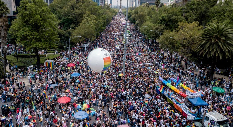 Revelers fill Mexico City's iconic Reforma Avenue during the gay pride parade, Saturday, Jun. 29, 2019. Pride Mexico