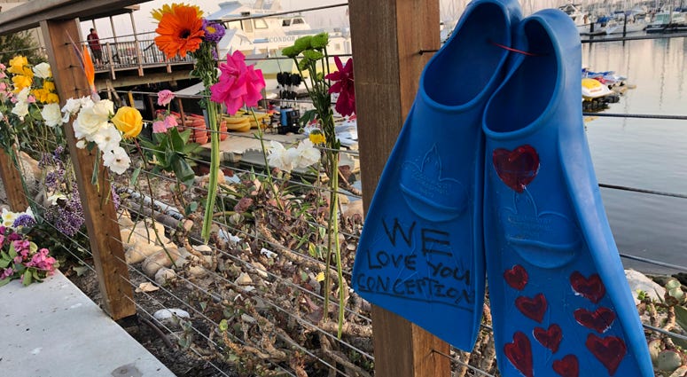 A memorial outside Truth Aquatics for the victims of the Conception boat fire, Monday, Sept. 2, 2019. Scuba diving boat fire