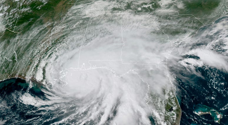 This GOES-16 GeoColor satellite image taken Tuesday, Sept. 15, 2020, at 3 p.m. EDT., and provided by NOAA, shows Hurricane Sally moving slowly towards the coast from the Gulf of Mexico. Hurricane Sally
